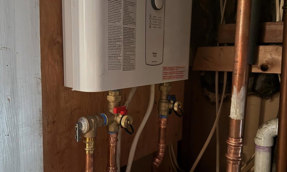 Copper water supply lines installed inside residential wall cavity